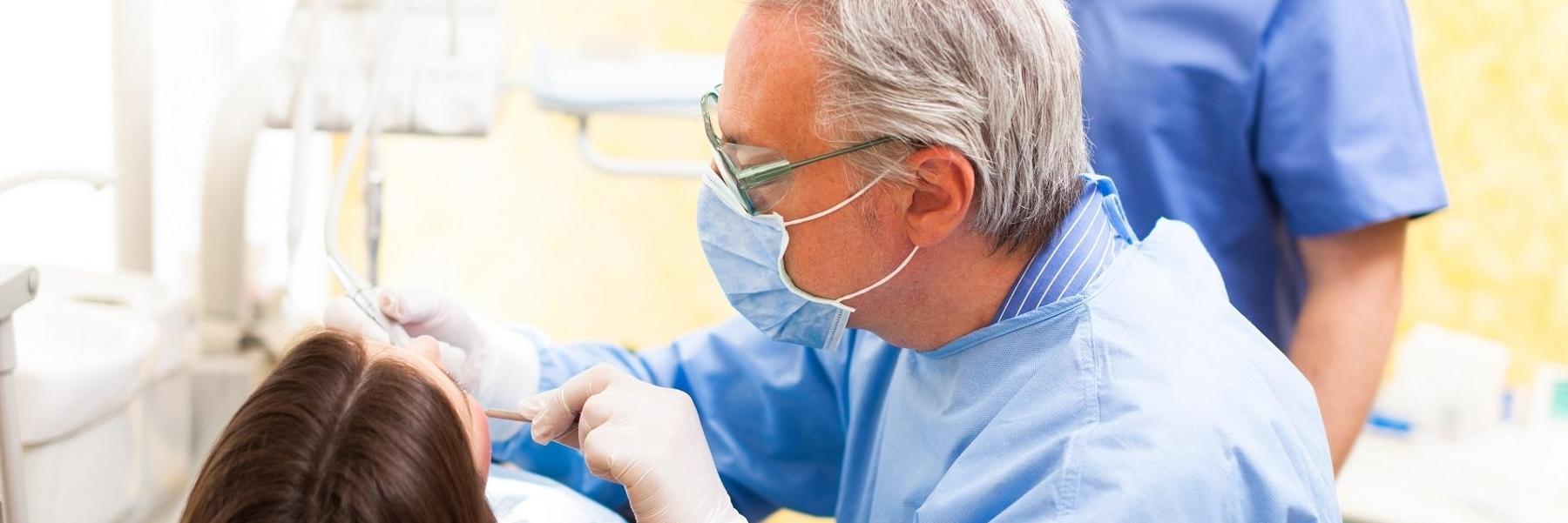 Dentist in Mitchell SD placing dental implants