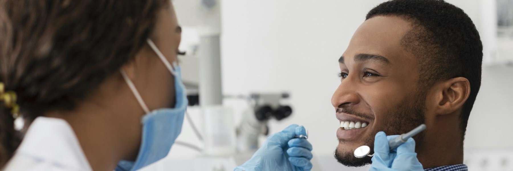 patient smiling after teeth cleaning in Mitchell SD 