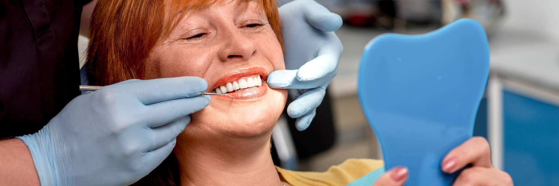 Woman patient receiving dental treatment in Mitchell SD