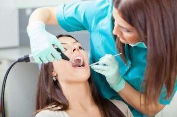 dentist removing tartar in Mitchell SD