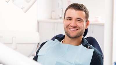 A relaxed male patient after dental treatment in Mitchell SD