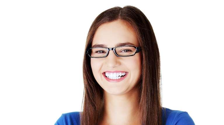 a girl wearing eyeglasses with overbite teeth in Mitchell