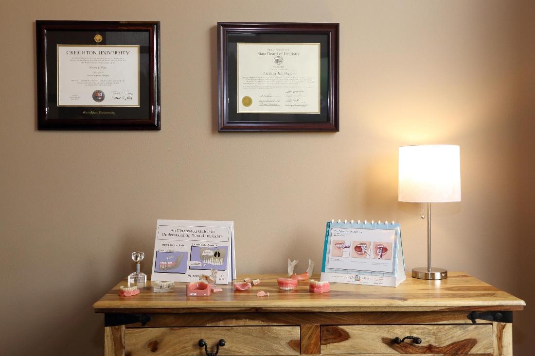 The dentist's diplomas at Dental Health Partners in Mitchell, SD